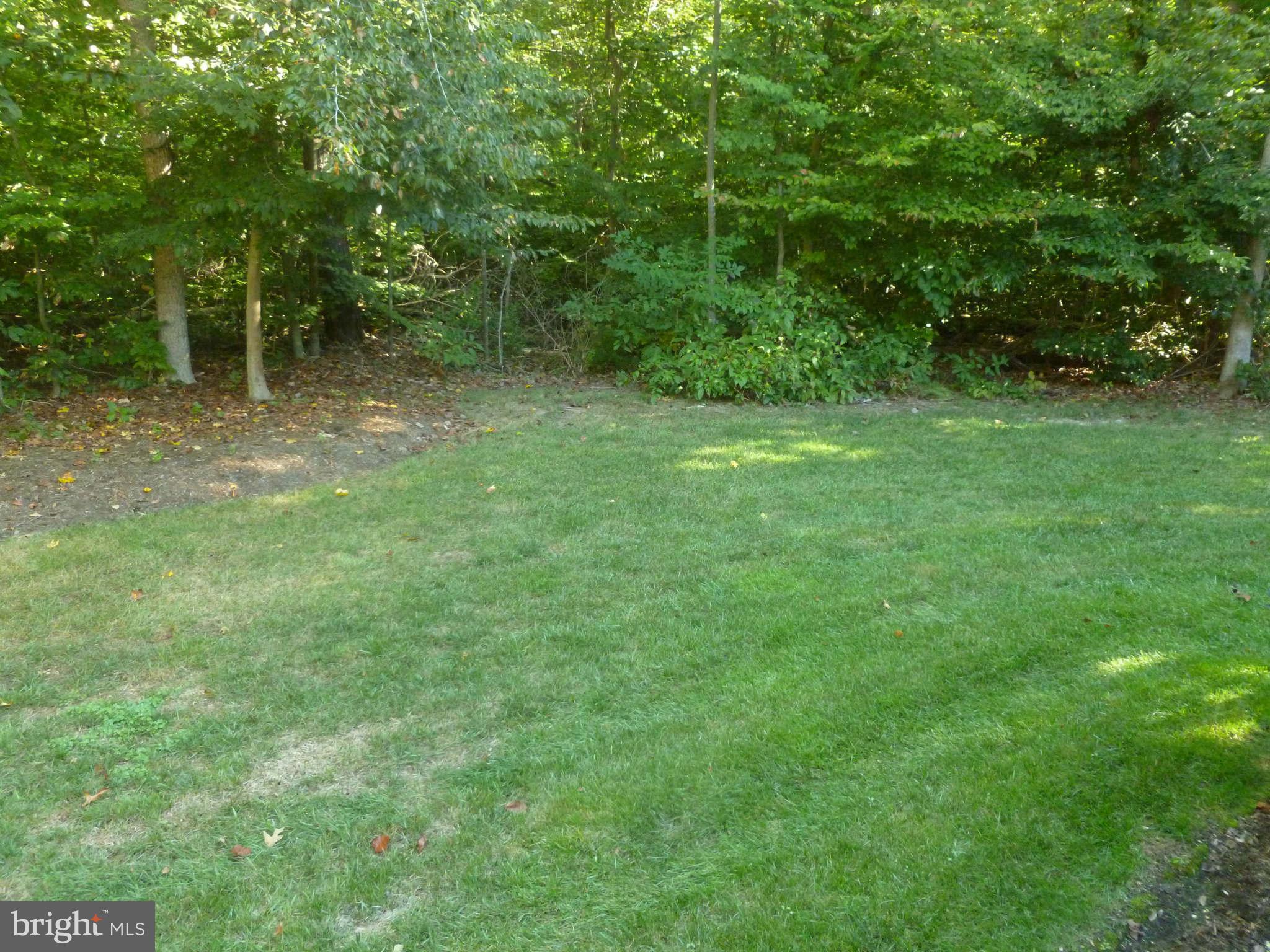 670 Small Reward Road Huntingtown, MD 20639 - Photo 24 of 26 a view of outdoor space and green space