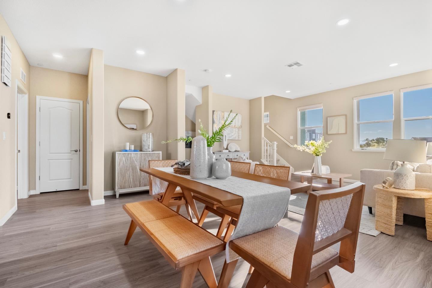 1306 Thistle Place Milpitas, CA 95035 - Photo 15 of 43 a dining room with furniture and wooden floor