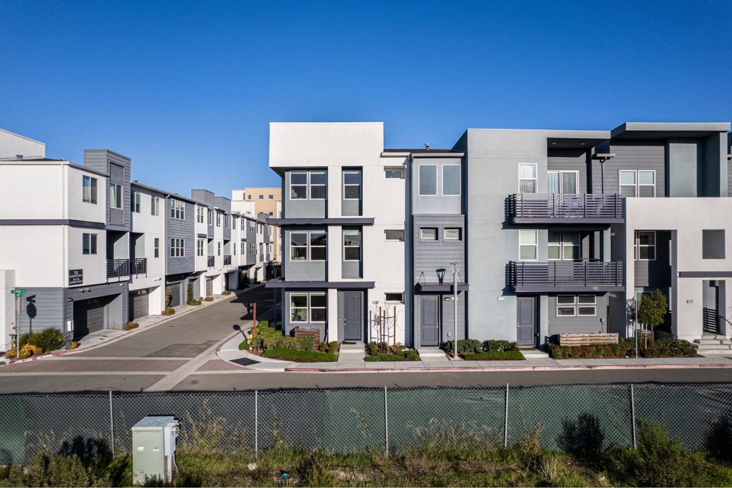 1306 Thistle Place Milpitas, CA 95035 - Photo 38 of 43 a front view of a building with street view
