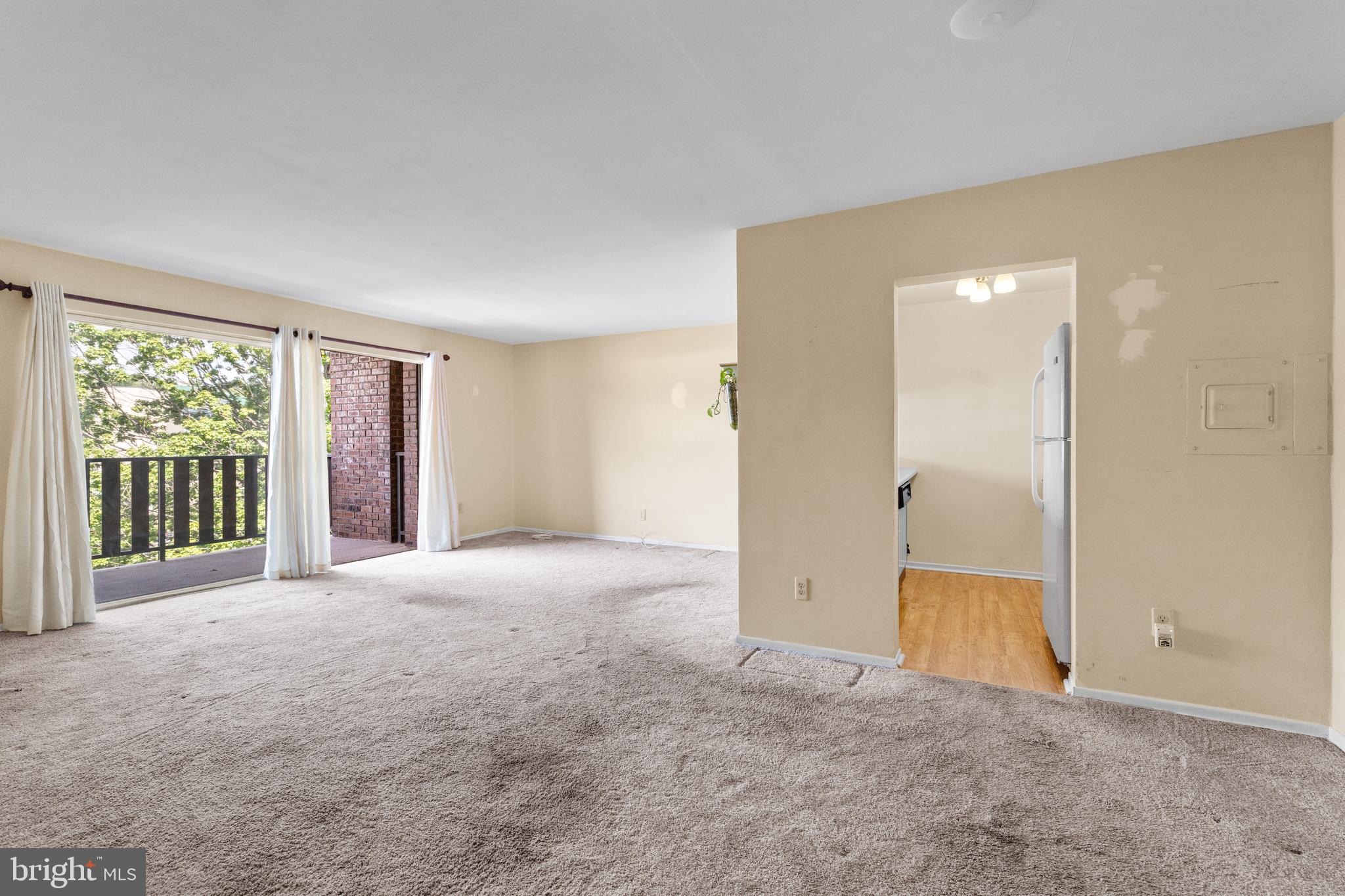 1570 The Fairway, Unit 402E Jenkintown, PA 19046 - Photo 6 of 20 Living/dining area.