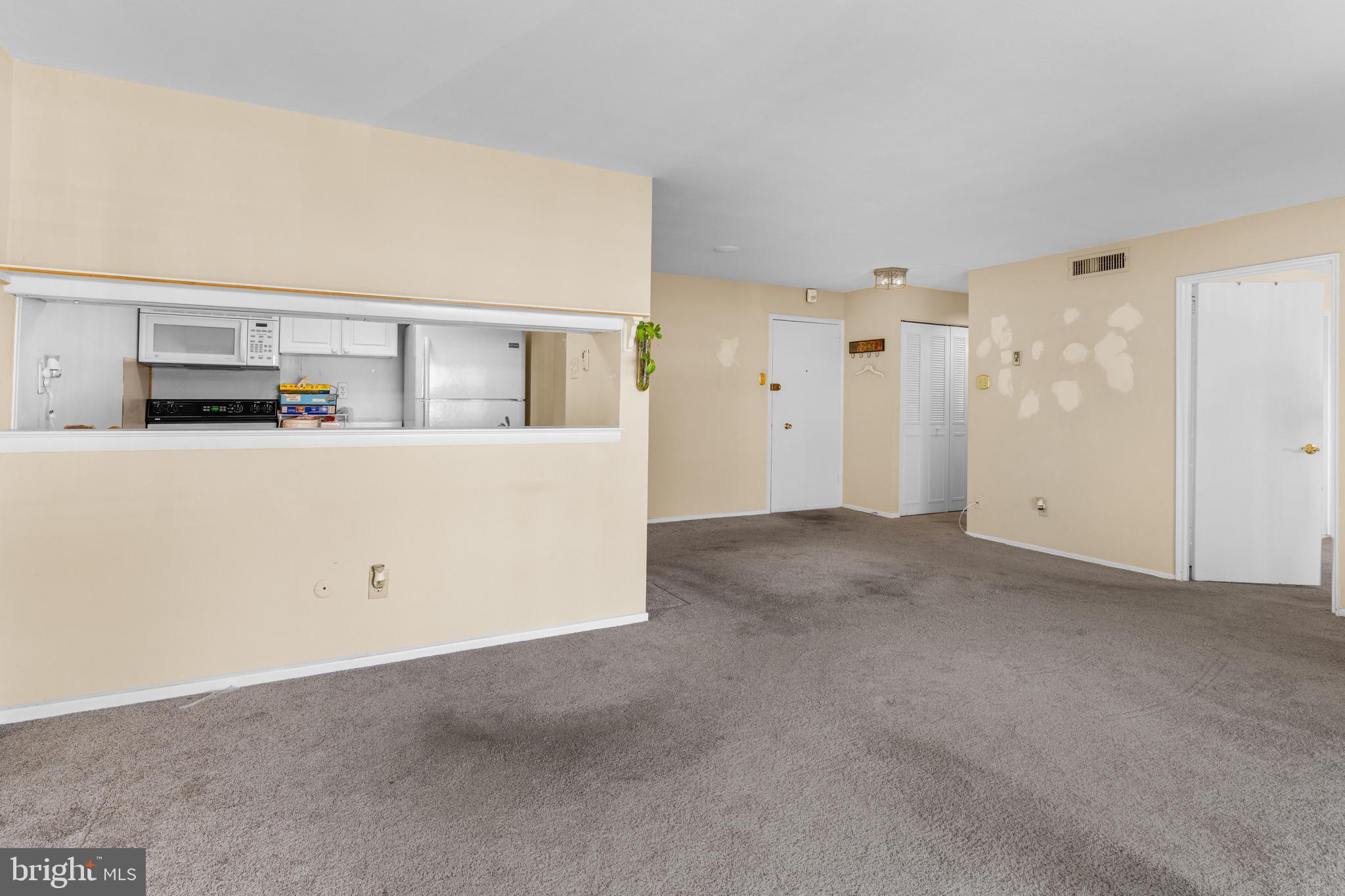 1570 The Fairway, Unit 402E Jenkintown, PA 19046 - Photo 9 of 20 Convenient kitchen pass-through.