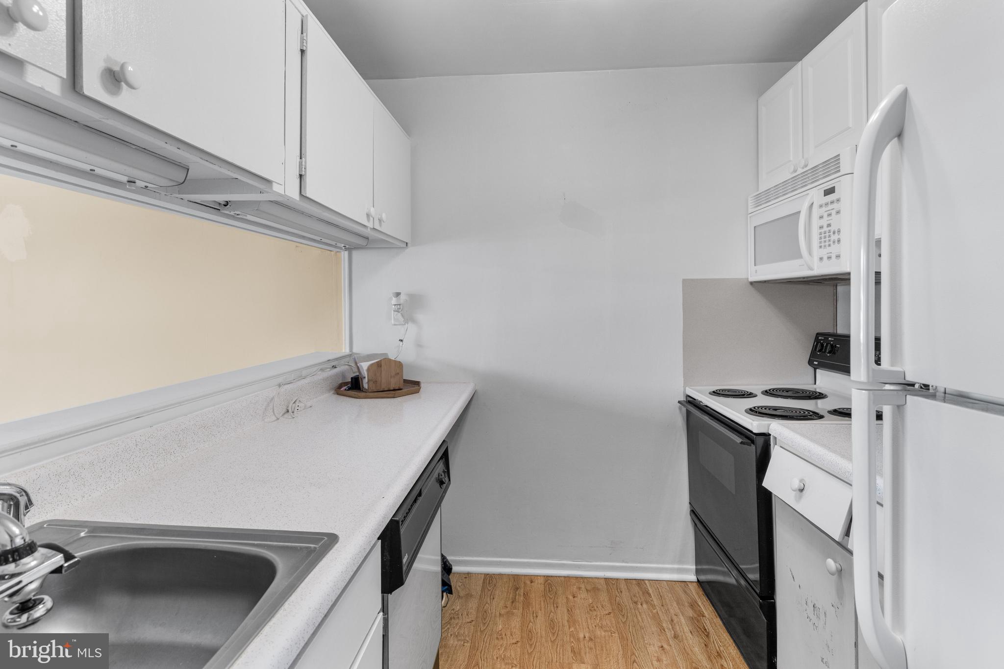 1570 The Fairway, Unit 402E Jenkintown, PA 19046 - Photo 10 of 20 Partially updated kitchen.