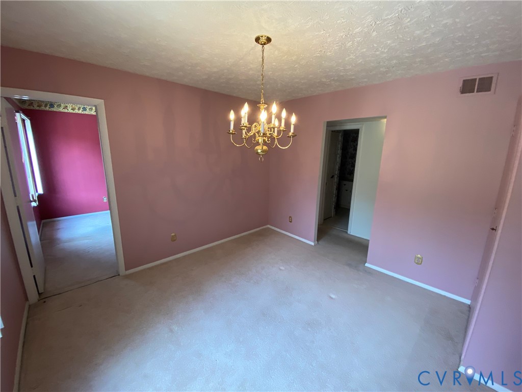 1507 Bronwyn Road, Unit 301 Henrico, VA 23238 - Photo 16 of 41 a view of a chandelier in big room and chandelier