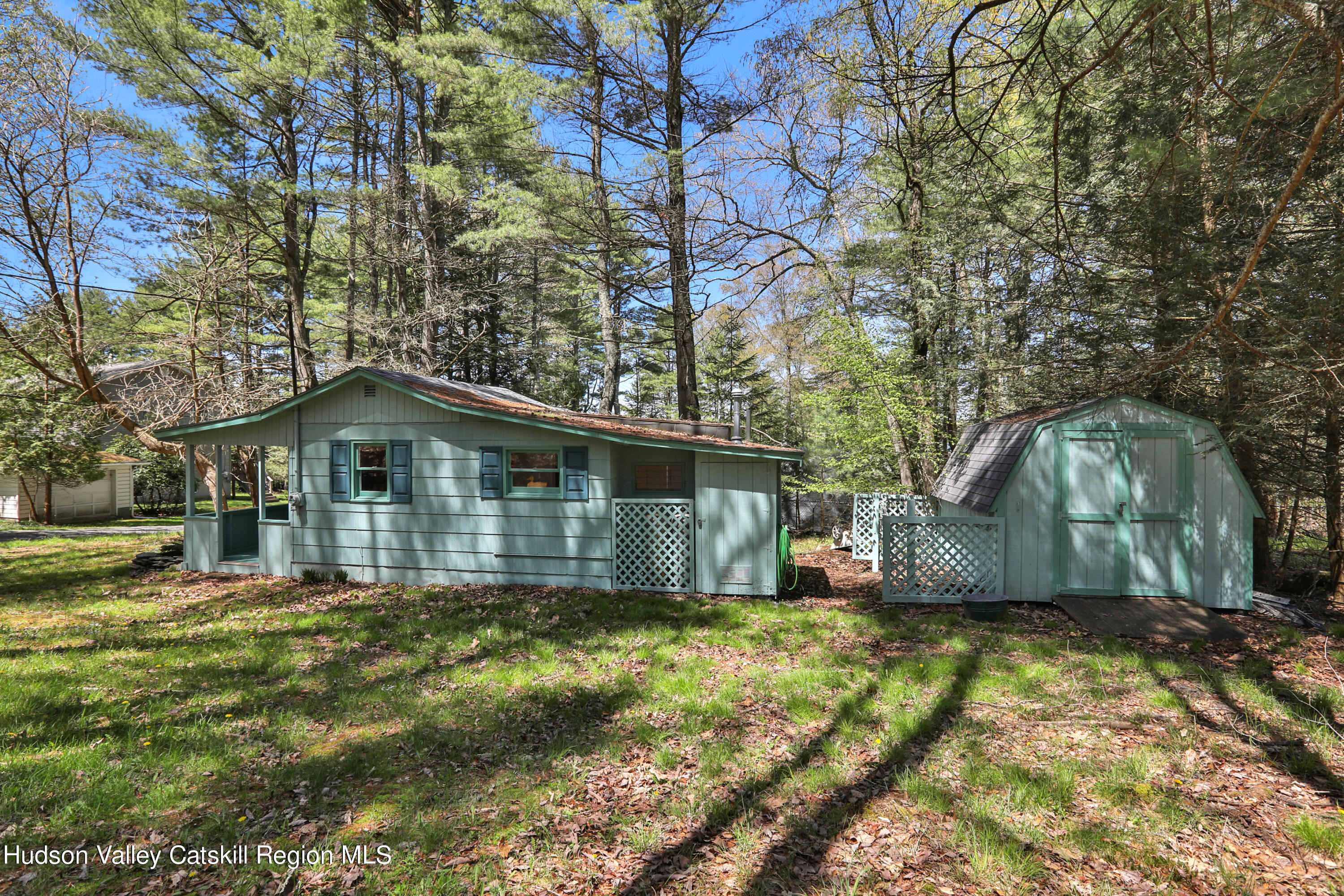 26 Beach Road Lumberland, NY 12737 - Photo 16 of 22 a front view of a house with a yard