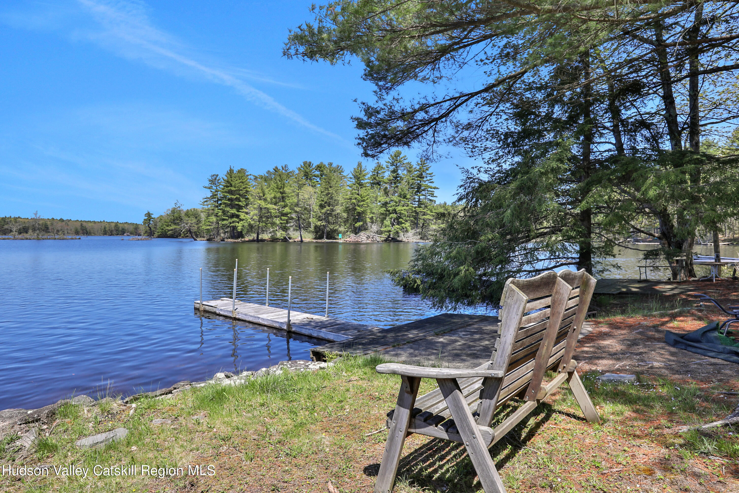 26 Beach Road Lumberland, NY 12737 - Photo 19 of 22 a view of a backyard with sitting area
