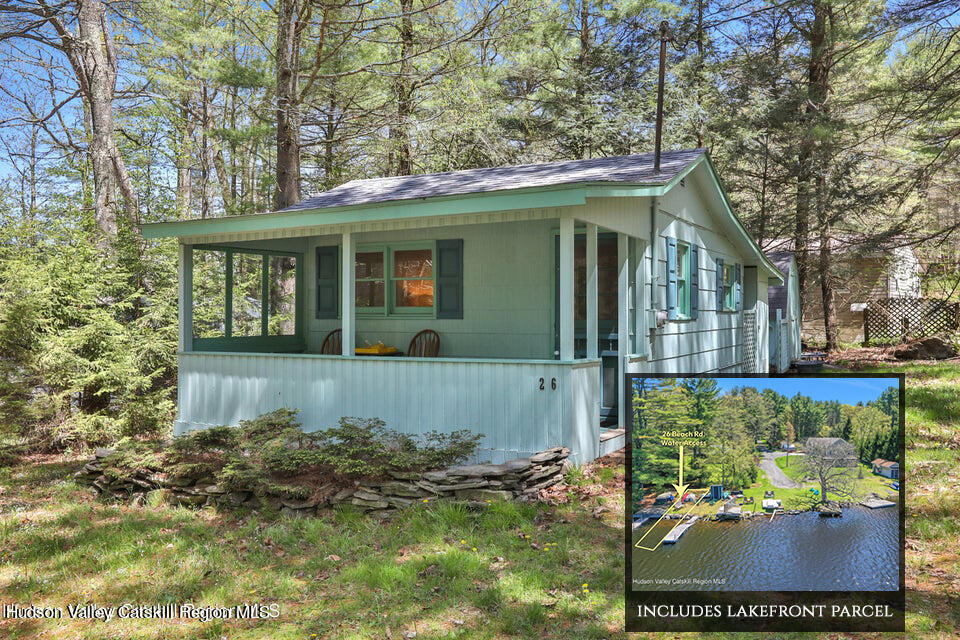 26 Beach Road Lumberland, NY 12737 - Photo 22 of 22 a front view of a house with garden