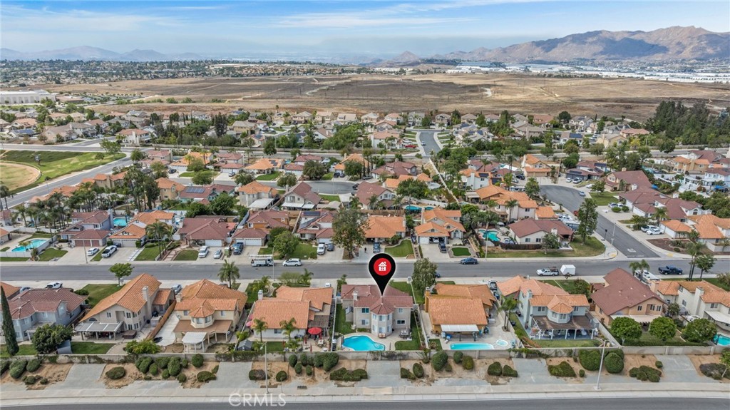 20257 Edmund Road Riverside, CA 92508 - Photo 48 of 53 an aerial view of residential building and lake