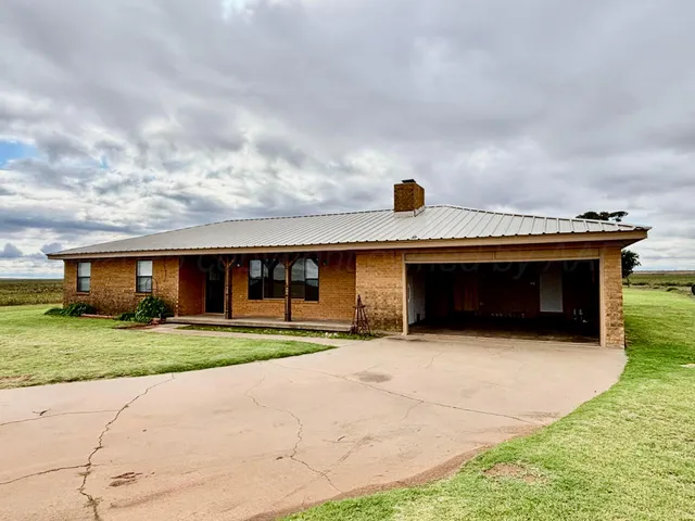 a front view of house with yard