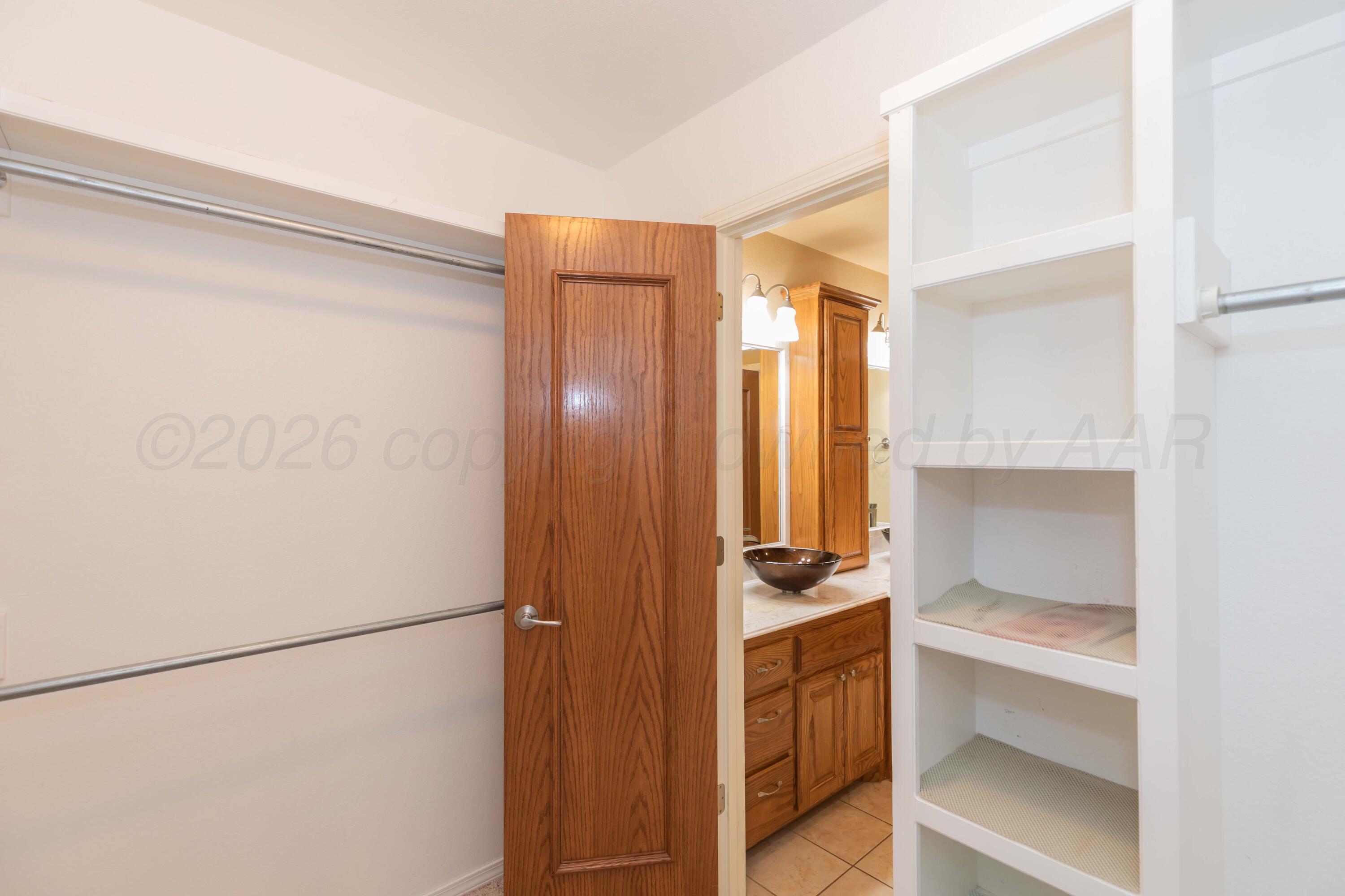 4519 Ida Louise Court Amarillo, TX 79110 - Photo 18 of 28 MASTER CLOSET VIEW 2