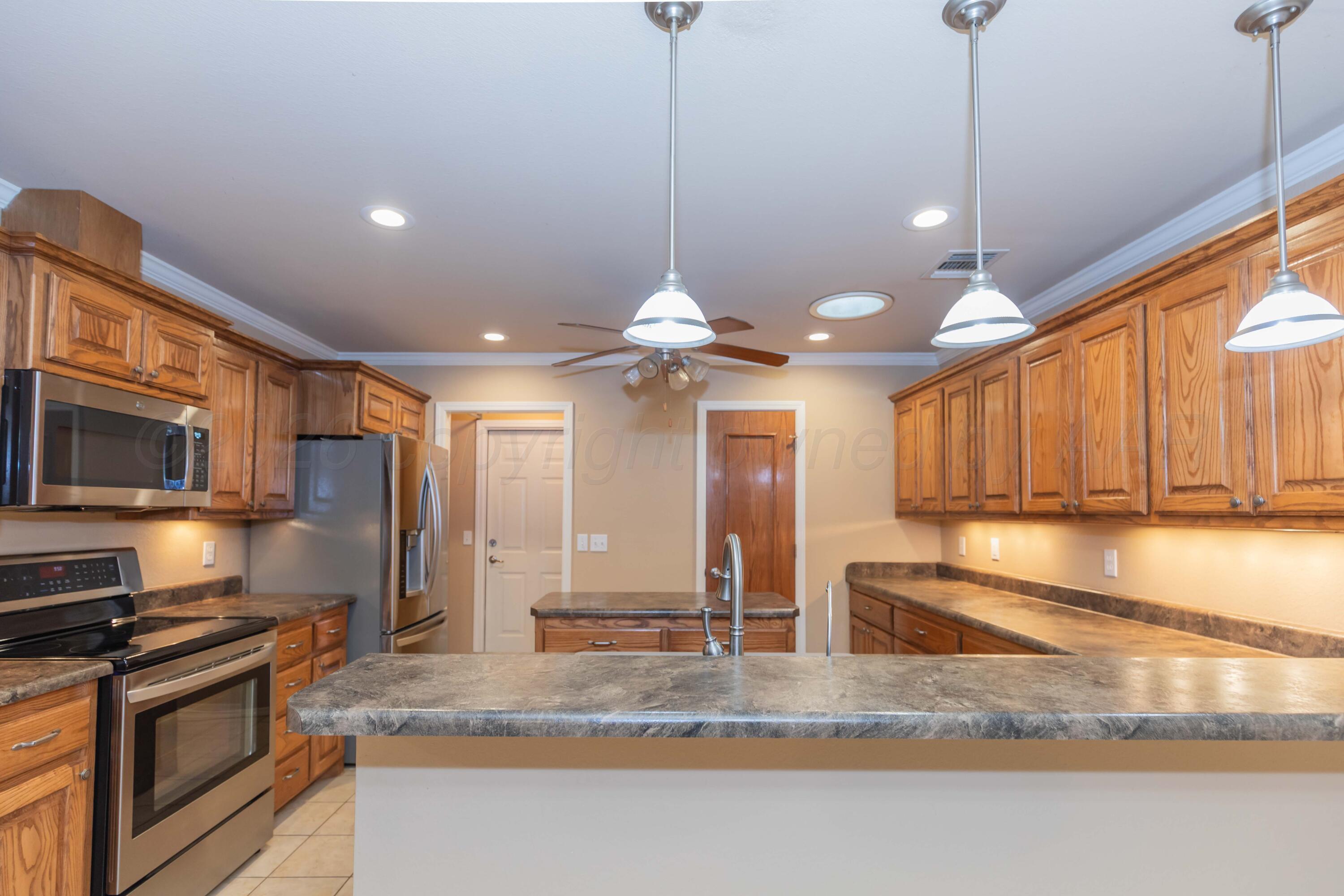 4519 Ida Louise Court Amarillo, TX 79110 - Photo 8 of 28 KITCHEN VIEW 2