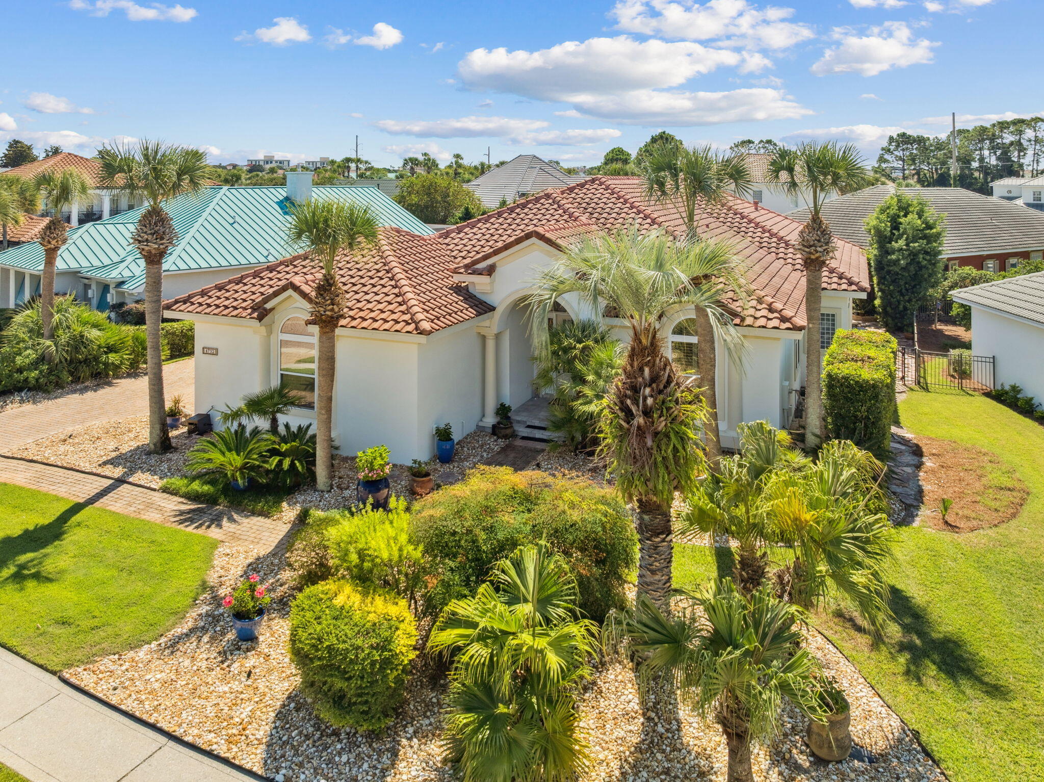 4732 Papaya Park Destin, FL 32541 - Photo 2 of 50 a view of a house with a big yard and potted plants