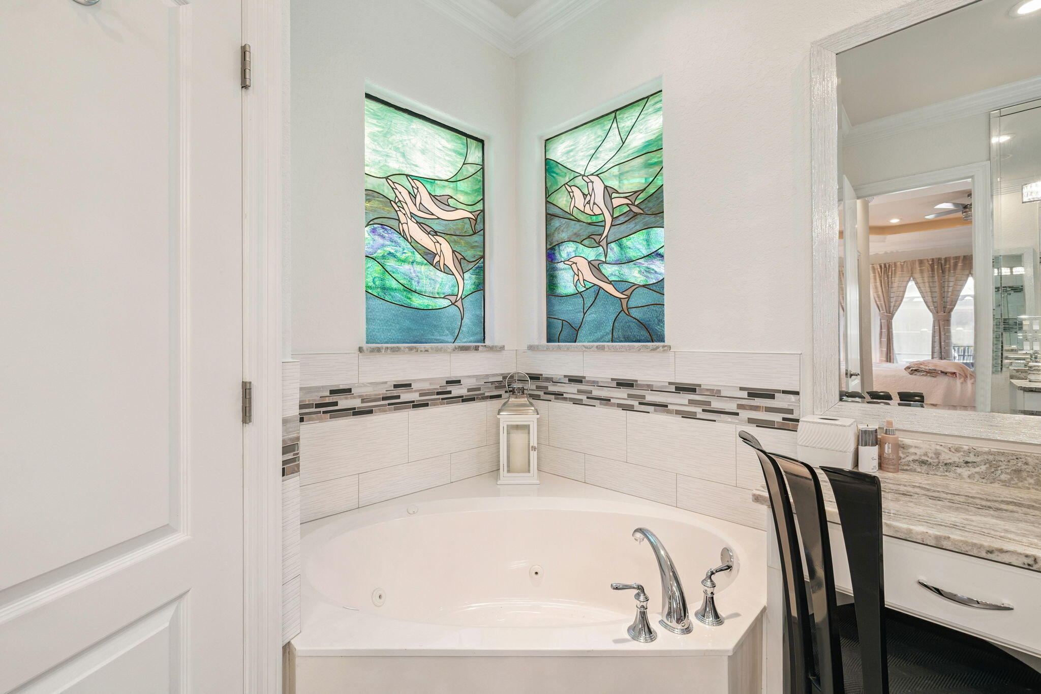 4732 Papaya Park Destin, FL 32541 - Photo 22 of 50 a bathroom with a tub sink and mirror