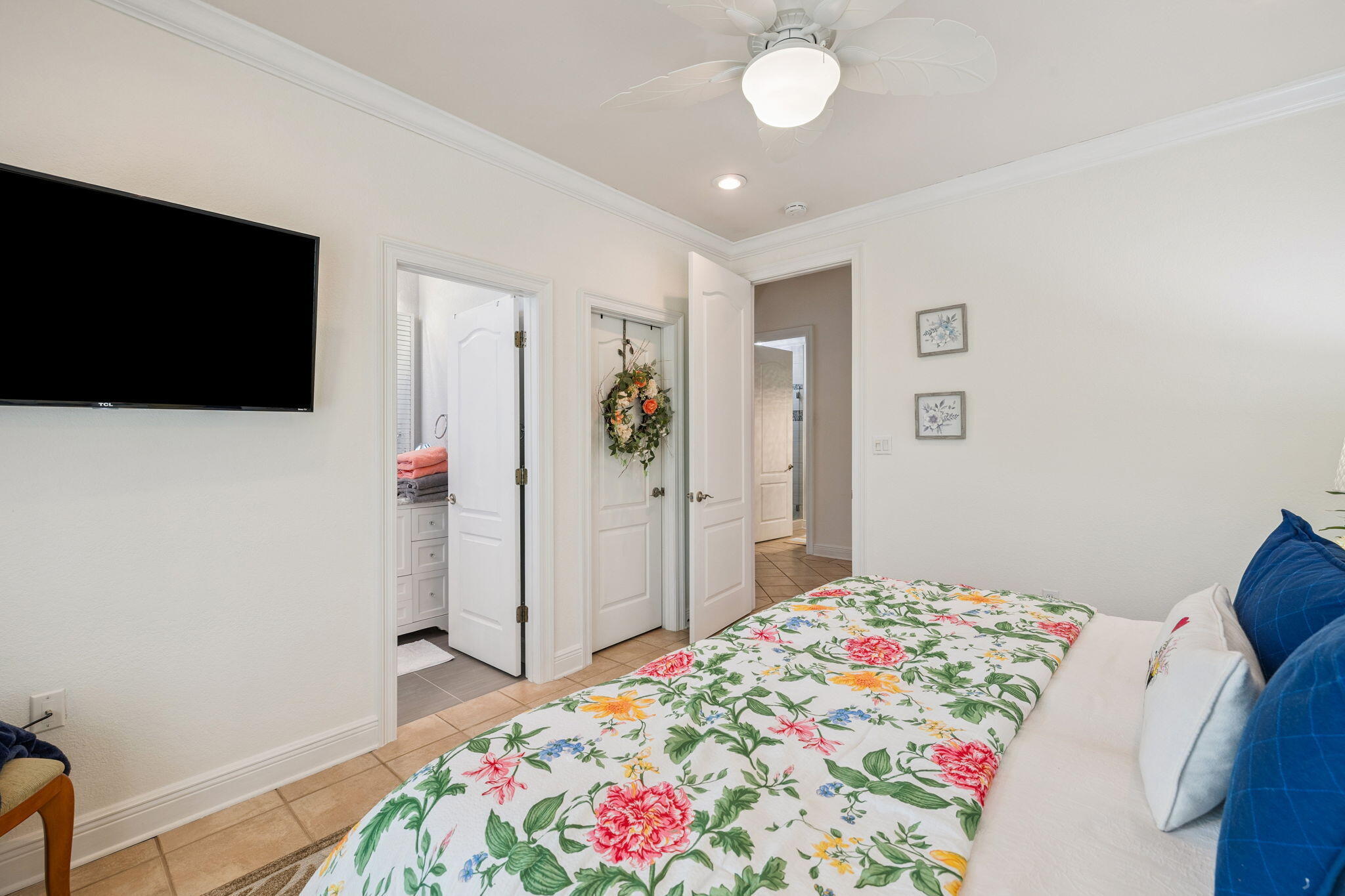 4732 Papaya Park Destin, FL 32541 - Photo 25 of 50 a bedroom with a bed and a flat screen tv