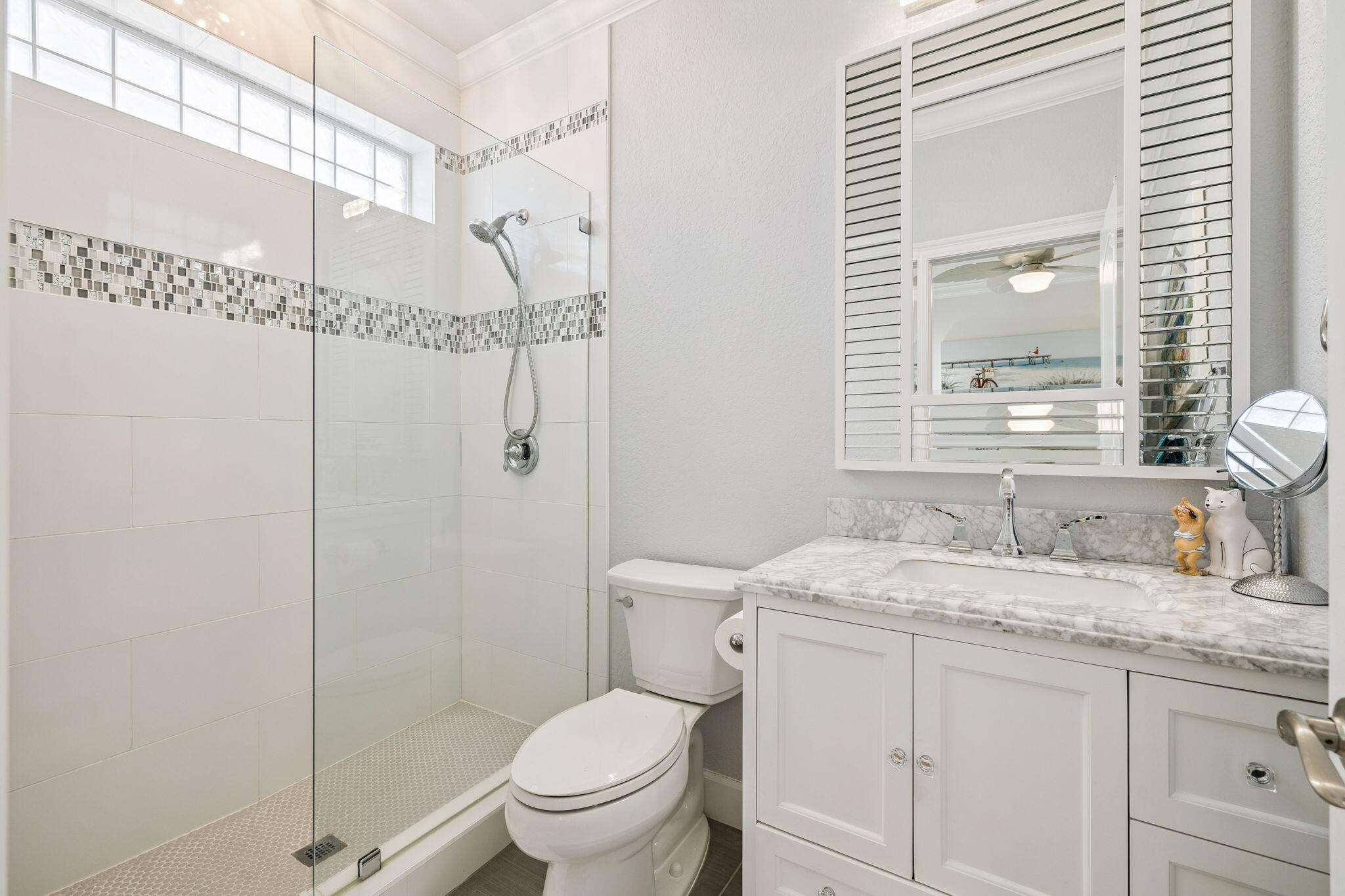 4732 Papaya Park Destin, FL 32541 - Photo 26 of 50 a bathroom with a granite countertop sink toilet and shower