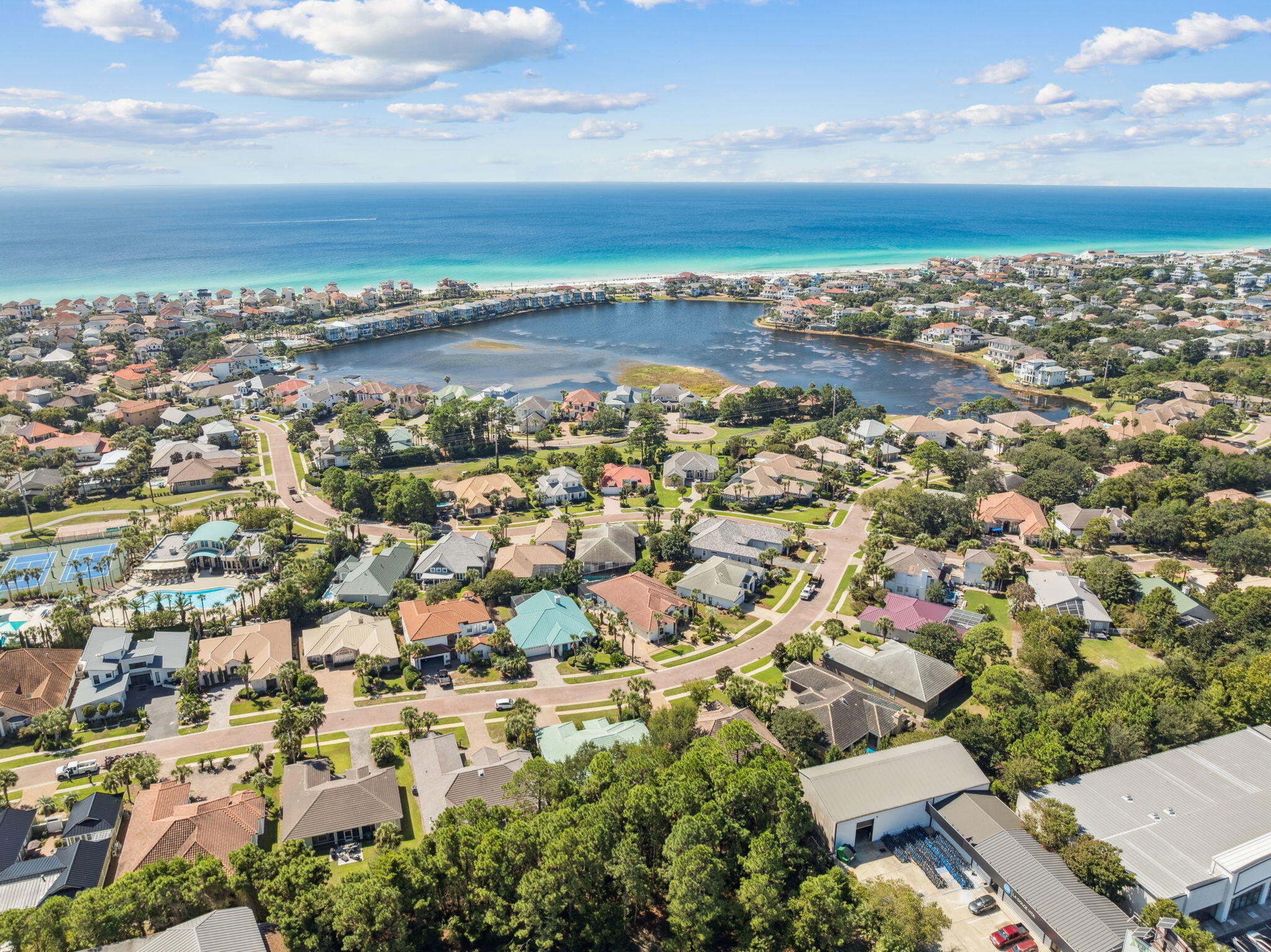 4732 Papaya Park Destin, FL 32541 - Photo 30 of 50 an aerial view of residential building with parking space