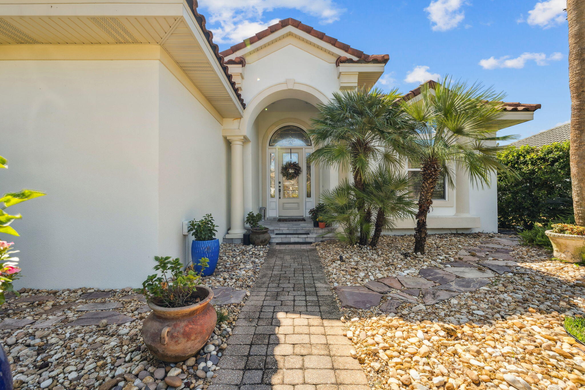 4732 Papaya Park Destin, FL 32541 - Photo 31 of 50 a view of a house with potted plants