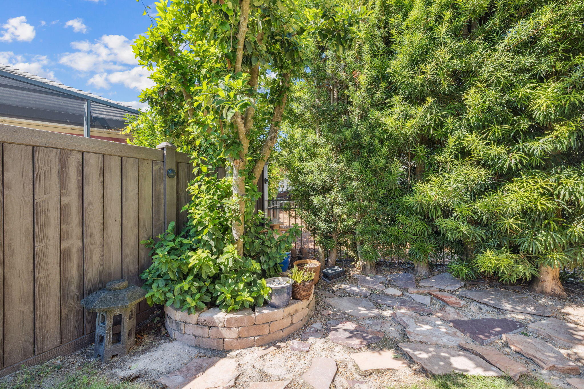 4732 Papaya Park Destin, FL 32541 - Photo 35 of 50 a view of a garden