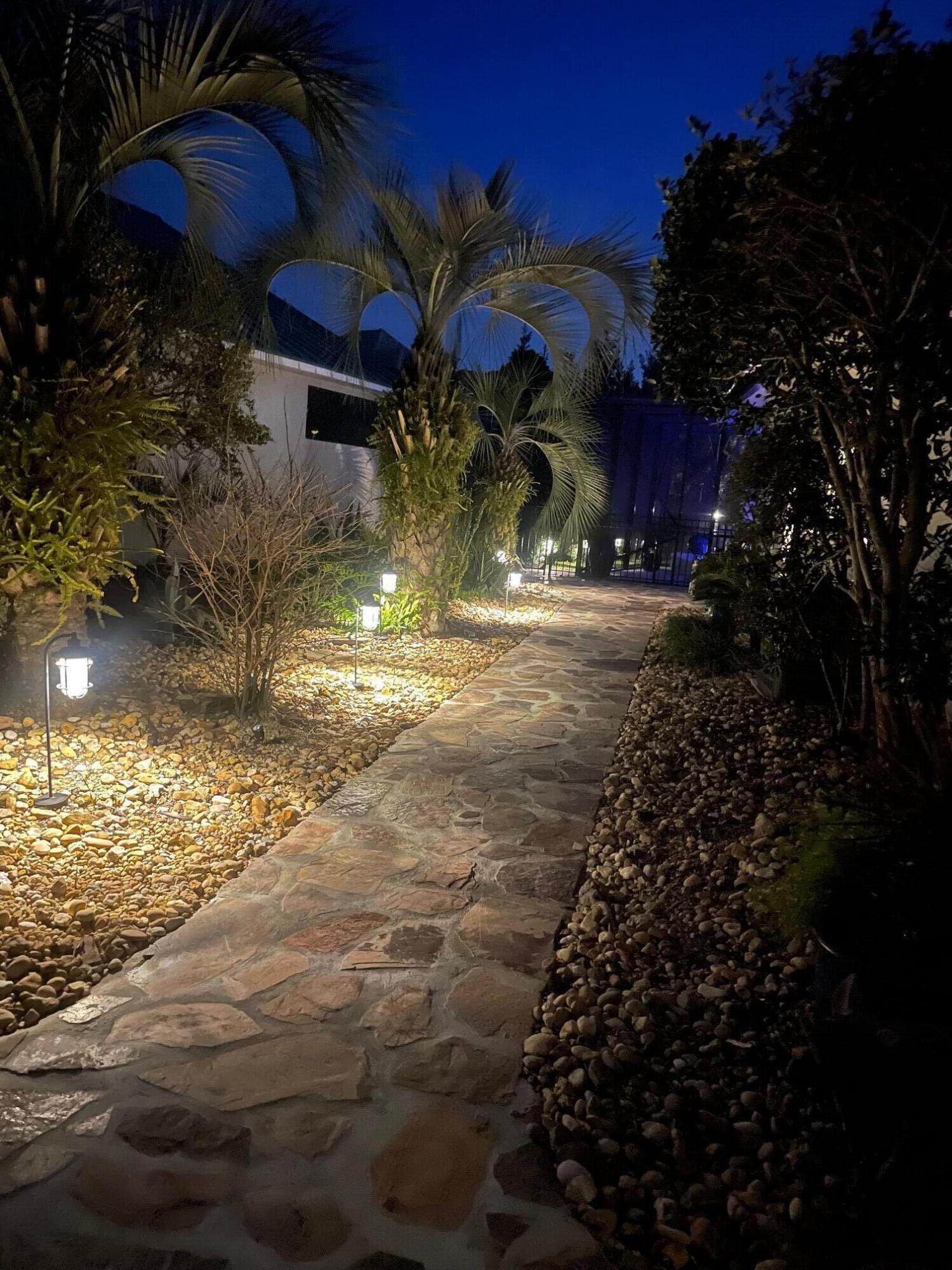 4732 Papaya Park Destin, FL 32541 - Photo 38 of 50 a view of swimming pool of water with lawn chairs and plants