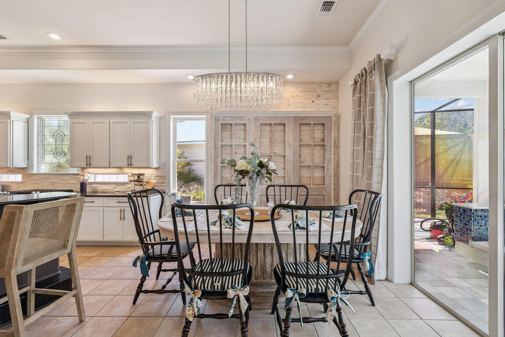 4732 Papaya Park Destin, FL 32541 - Photo 8 of 50 a view of a dining room with furniture and chandelier