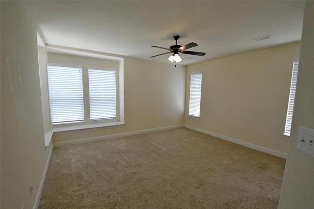 an empty room with windows