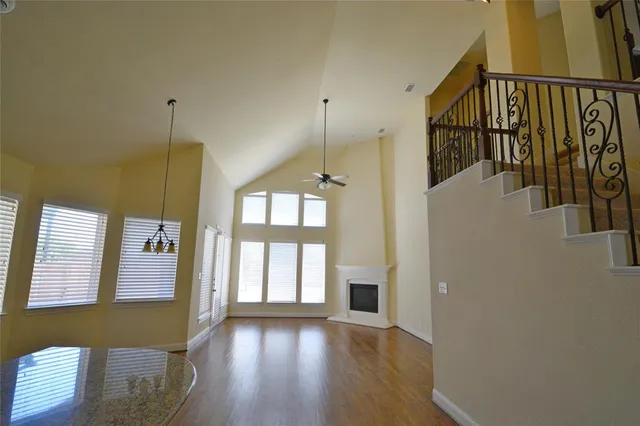 a view of a hallway with windows