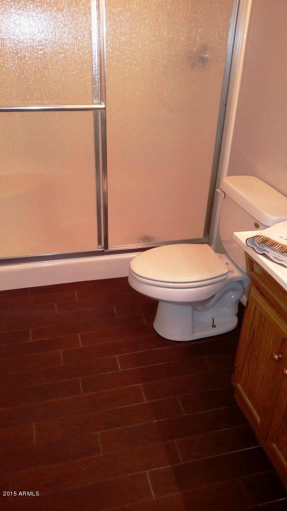3433 West Redfield Road Phoenix, AZ 85053 - Photo 26 of 43 Remodeled Bath with New Floor