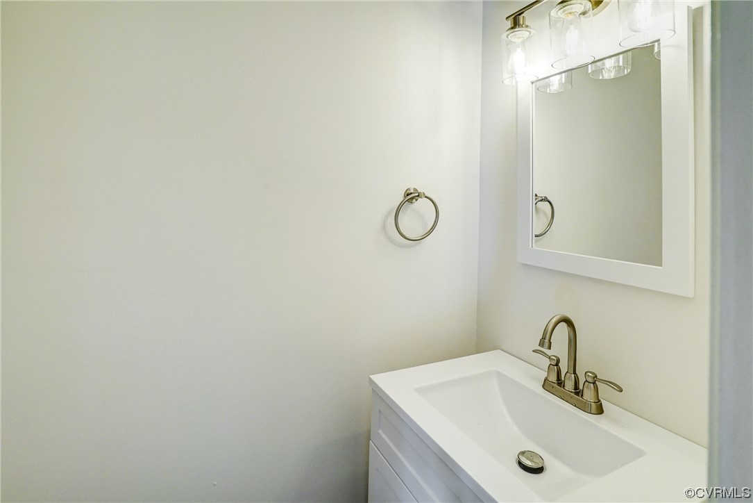 603 Bailey Road Charlottesville, VA 22903 - Photo 15 of 37 a bathroom with a sink and mirror