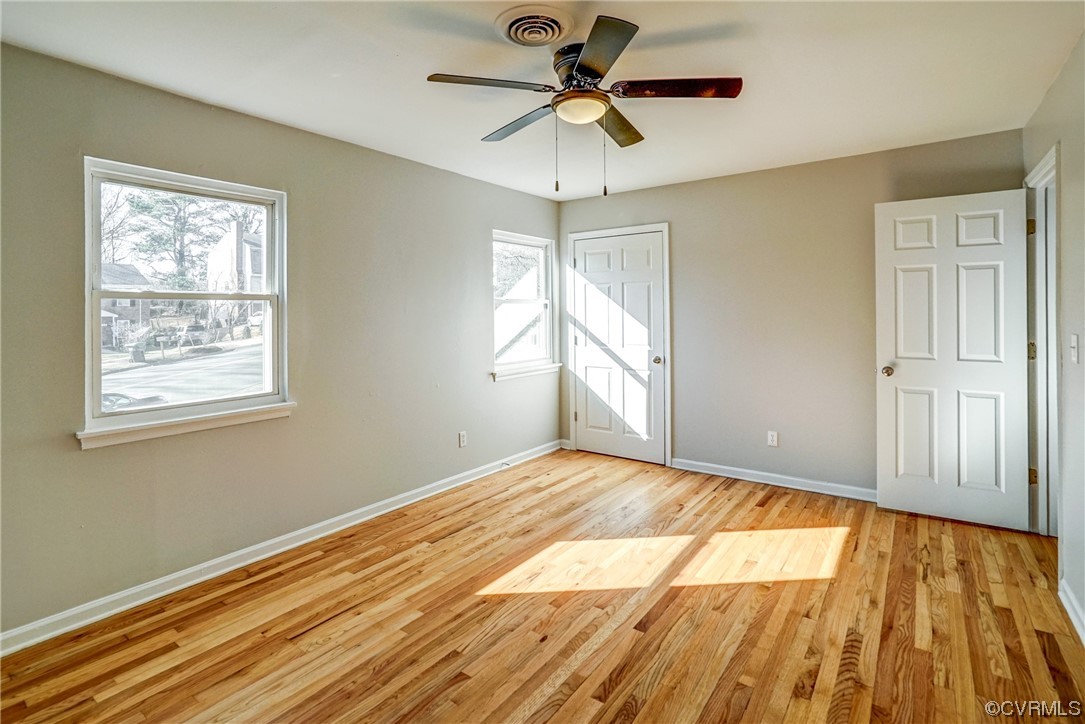 603 Bailey Road Charlottesville, VA 22903 - Photo 25 of 37 a view of empty room with wooden floor and fan