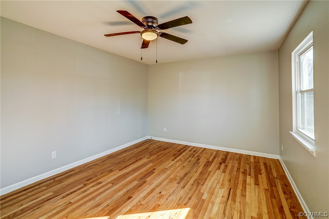 603 Bailey Road Charlottesville, VA 22903 - Photo 26 of 37 an empty room with a window and a ceiling fan
