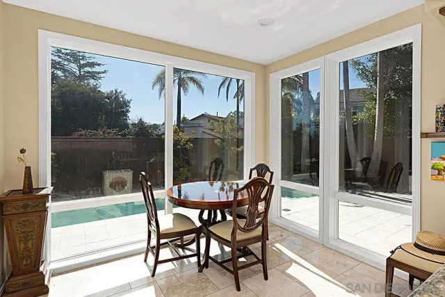 a kitchen with sink stove and cabinets