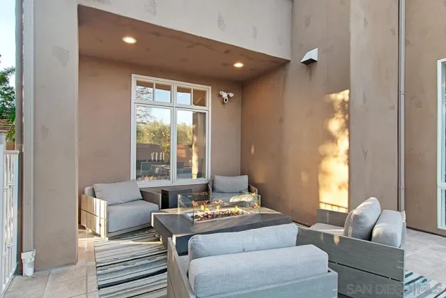 a bathroom with a sink and mirror with toilet