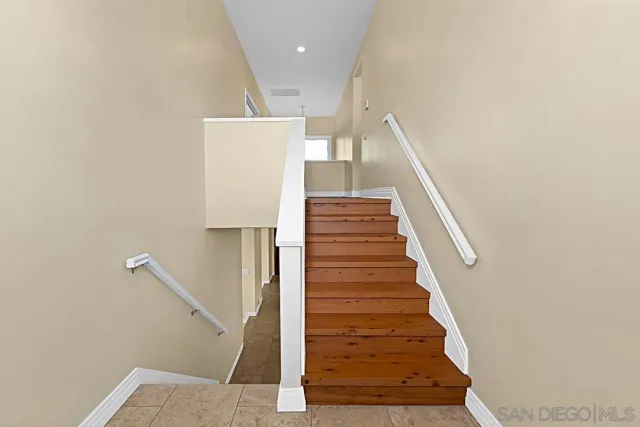 a bedroom with a bed and a fireplace