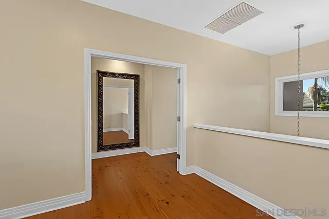 a bathroom with a sink and a large mirror