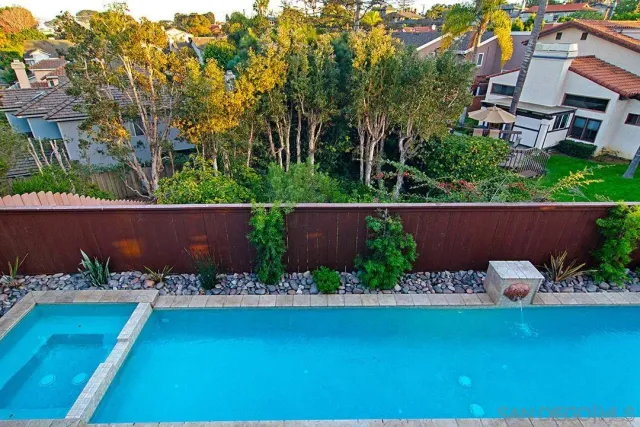 a view of a hallway with front door