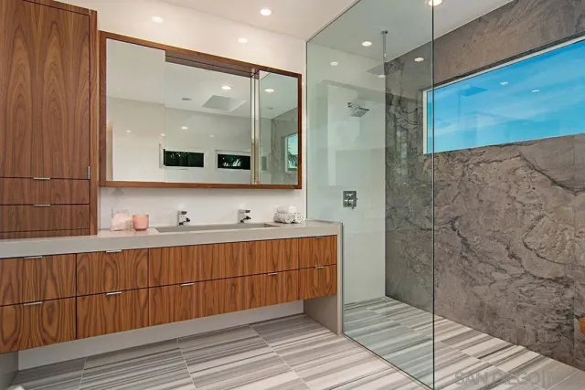 a bedroom with a bed and a table in it