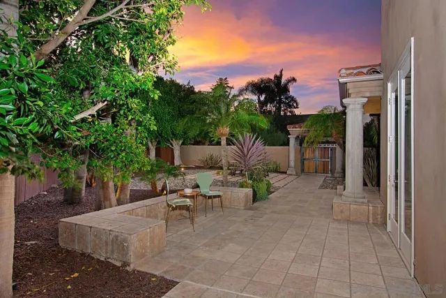 a view of a hallway with a dining area