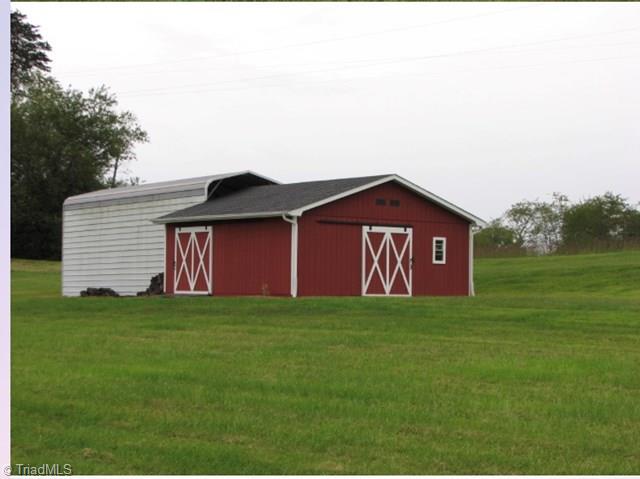 1240 Shingle Gap Road Purlear, NC 28665 - Photo 44 of 45 Barn & Open storage building