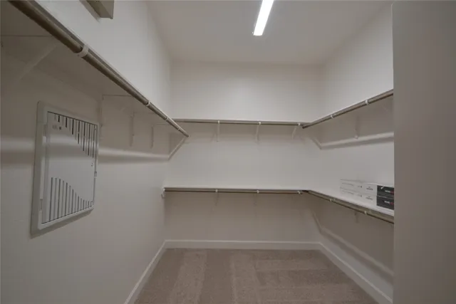 a bathroom with a double vanity sink toilet mirror and bathtub