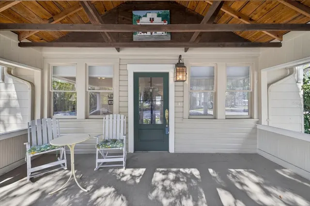 a front view of a house with a large window