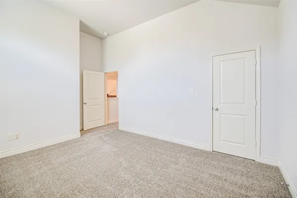 an empty room with an entryway