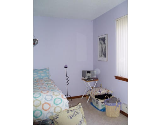 28 Parkman Street, Unit 2 Brookline, MA 02446 - Photo 8 of 8 a bathroom with a toilet and a shower curtain