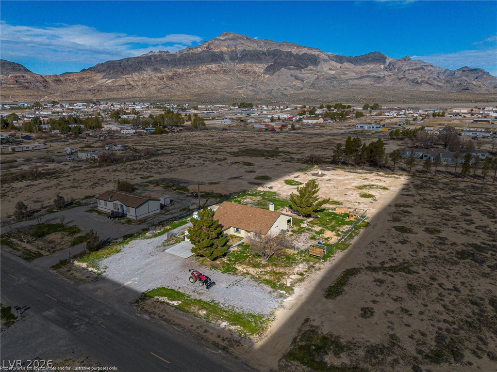 2780 West Simkins Road Pahrump, NV 89060 - Photo 38 of 40 Panoramic mountain views encompass this sprawling rural property with potential.