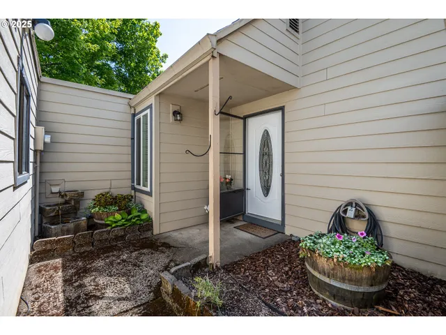 a backyard of a house with lots of green space