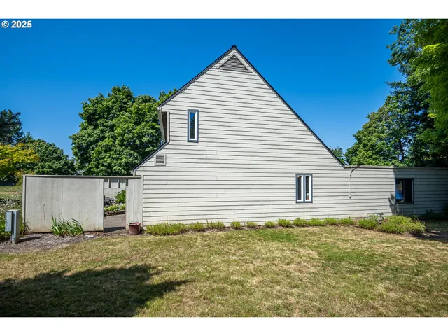 a house view with a backyard space
