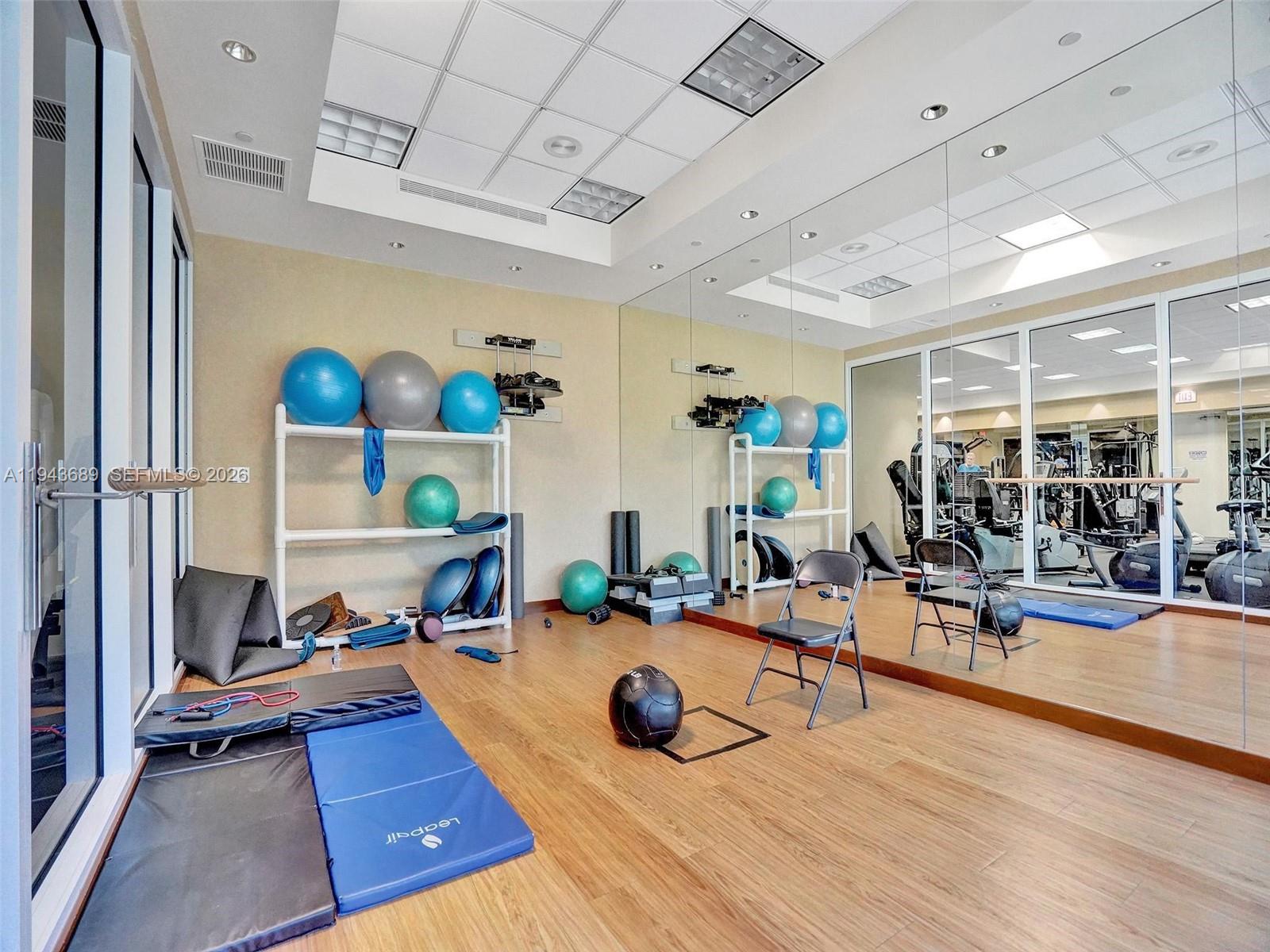9595 Collins Avenue, Unit N8H Surfside, FL 33154 - Photo 29 of 35 a view of a room with gym equipment