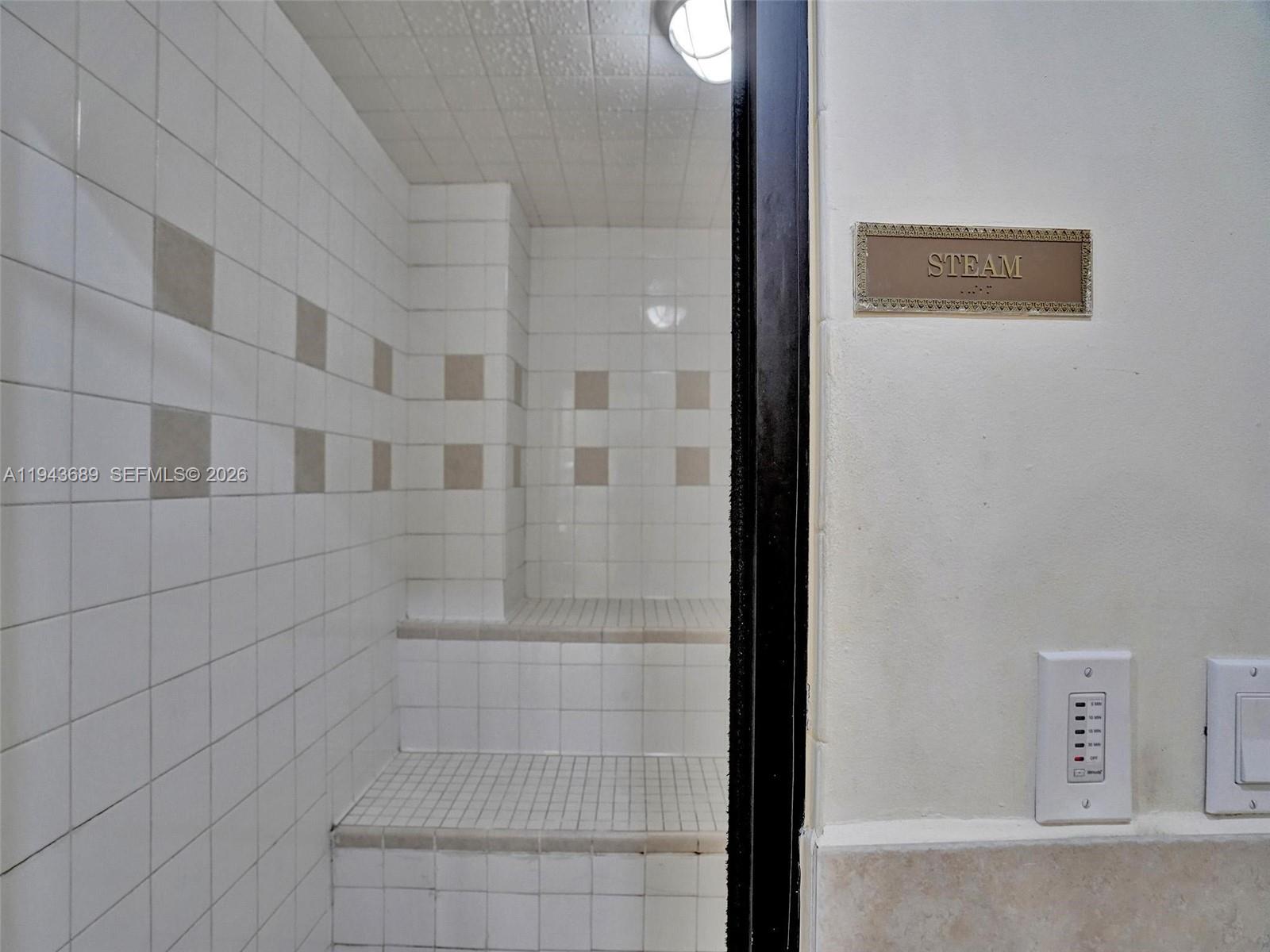 9595 Collins Avenue, Unit N8H Surfside, FL 33154 - Photo 35 of 35 a bathroom with a shower