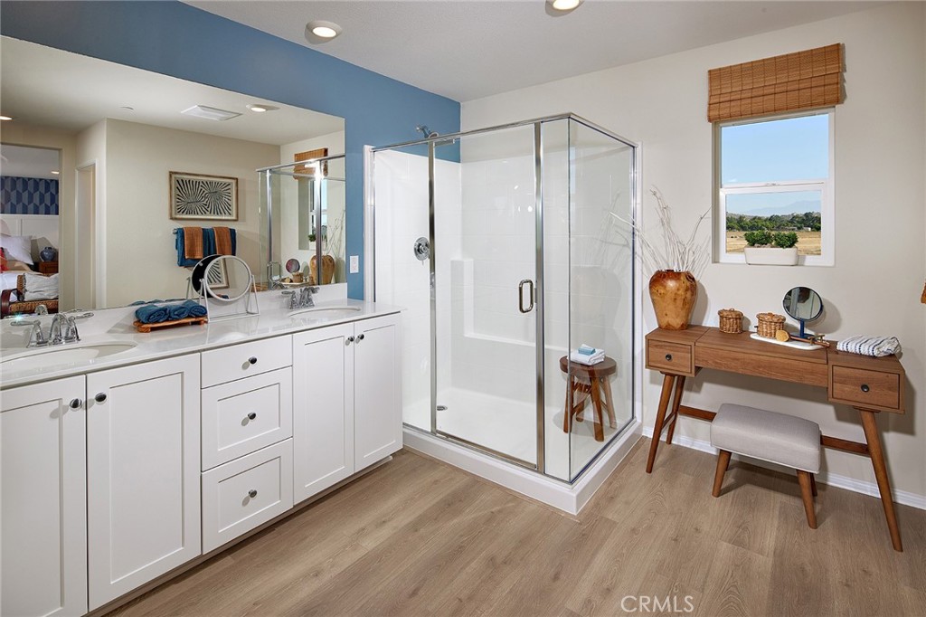 2039 Fernetta Place Perris, CA 92571 - Photo 12 of 22 a room with white cabinets and sink