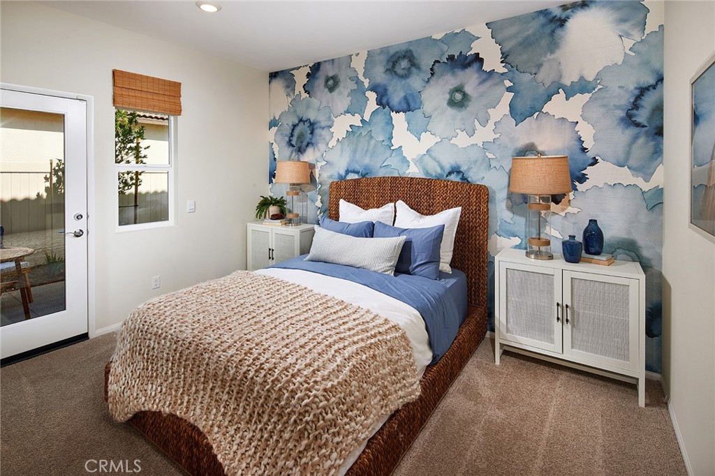 2039 Fernetta Place Perris, CA 92571 - Photo 21 of 22 a bedroom with bed and window