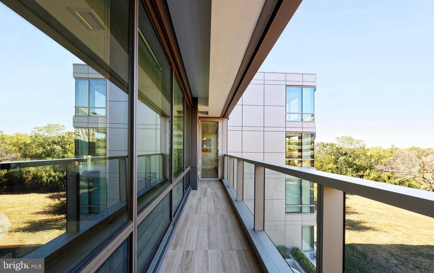 2501 M Street Northwest, Unit 311 Washington, DC 20037 - Photo 5 of 27 a view of balcony with wooden floor