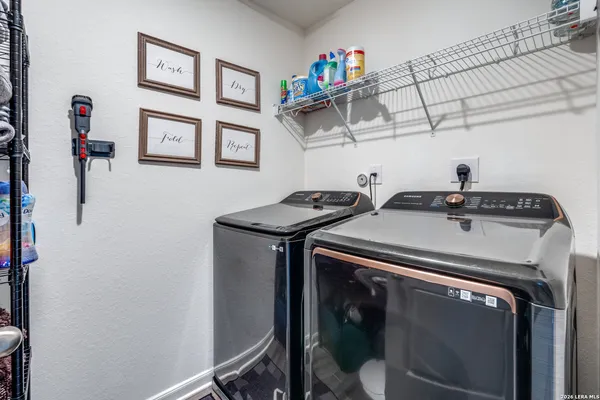 a utility room with dryer and washer